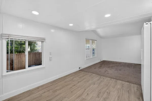 a backyard of a house with lots of green space