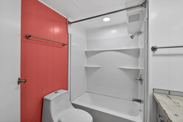 a view of backyard with cabin