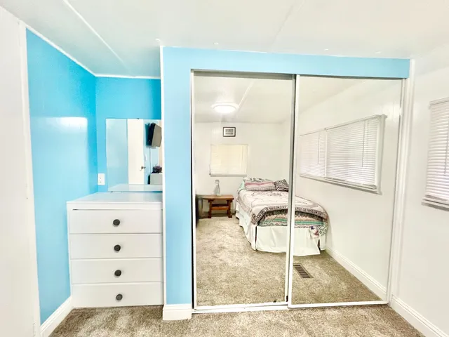 a bathroom with a double vanity sink and mirror