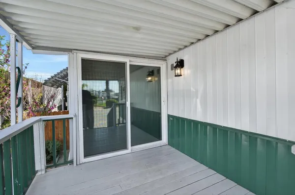 a kitchen with stainless steel appliances granite countertop a stove and a refrigerator