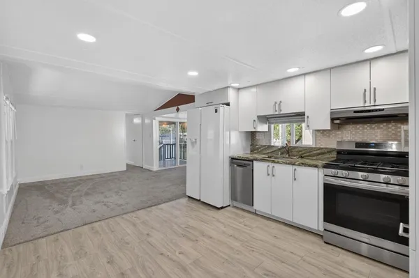 a bathroom with a shower and a toilet