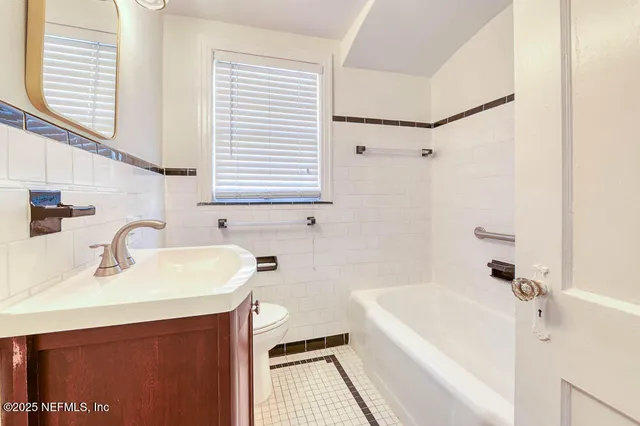 a bathroom with a sink and a bathtub