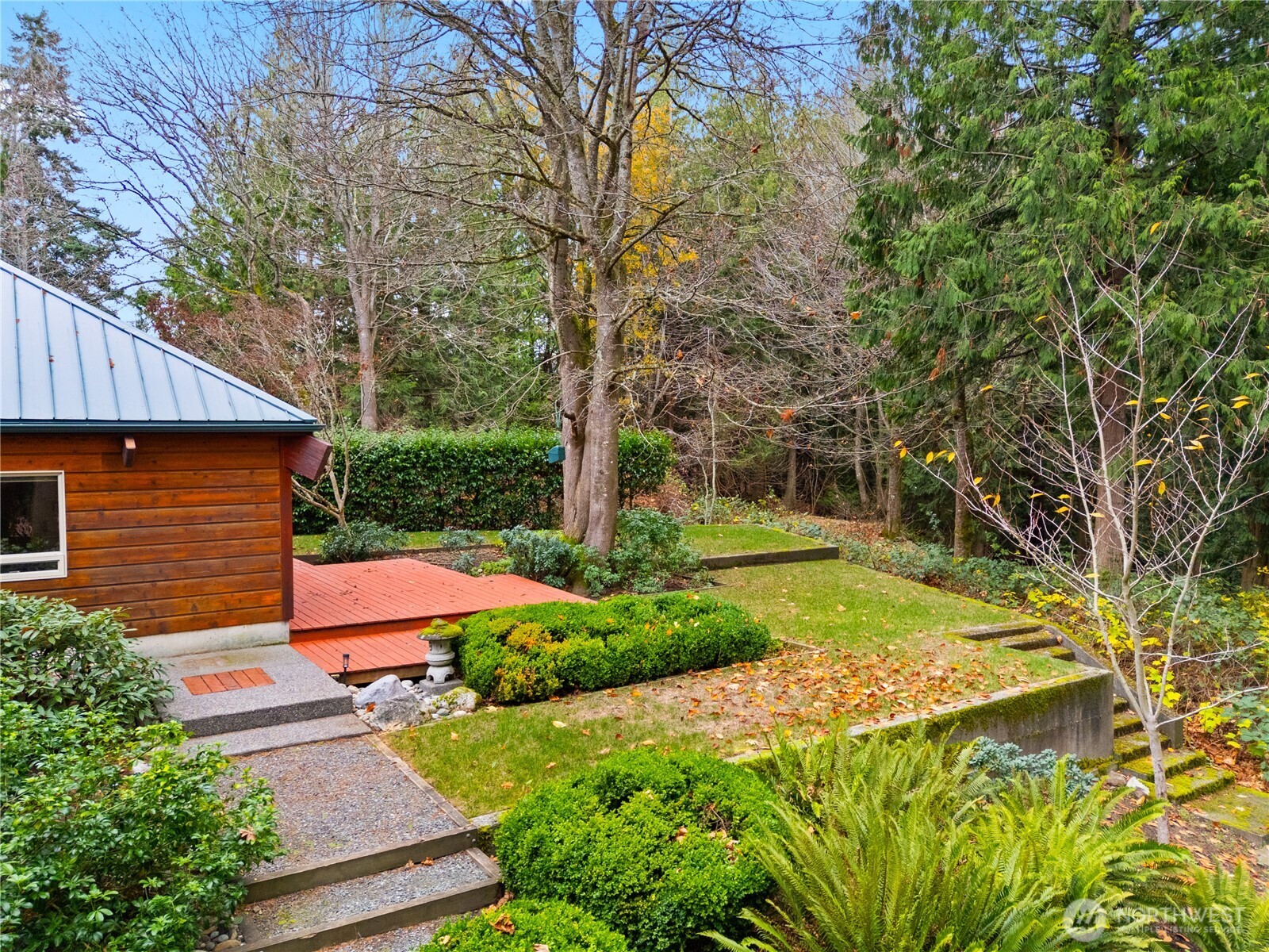 2204 41st Street Anacortes, WA 98221 - Photo 26 of 36 a front view of house with yard and green space