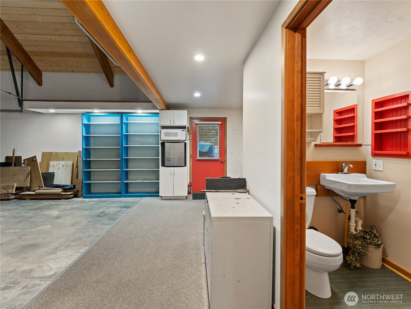 2204 41st Street Anacortes, WA 98221 - Photo 34 of 36 a bathroom with a sink toilet and mirror