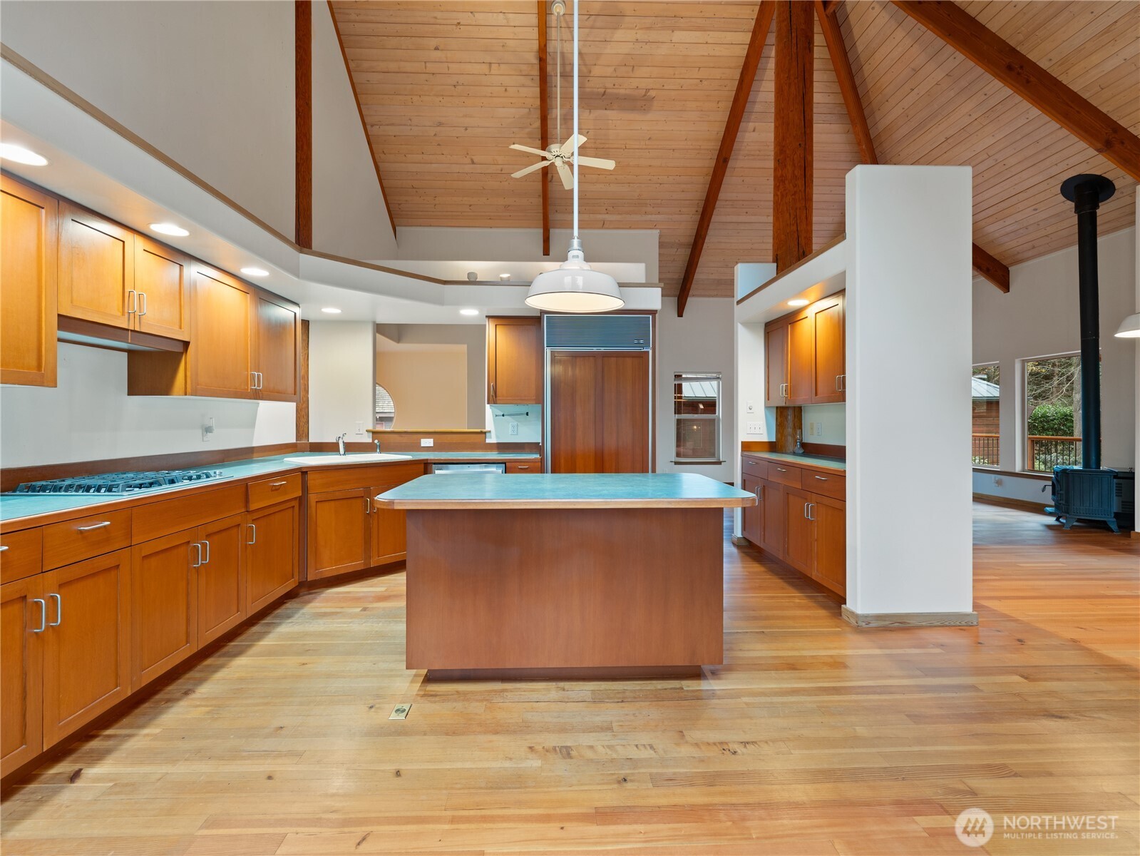 2204 41st Street Anacortes, WA 98221 - Photo 4 of 36 a kitchen with stainless steel appliances granite countertop a stove a sink and a refrigerator