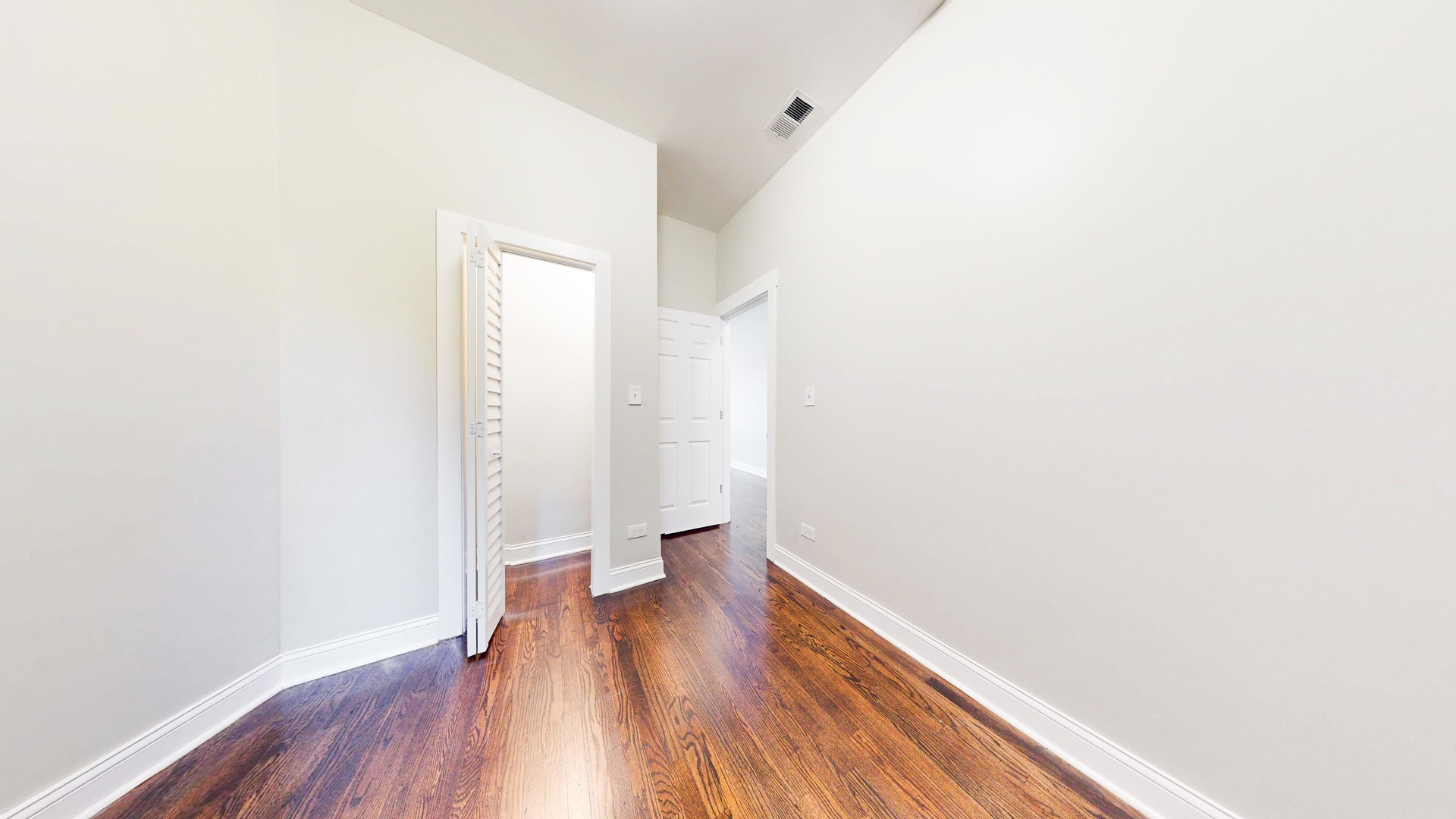 6137 South Morgan Street Chicago, IL 60621 - Photo 11 of 33 a view of a room with wooden floor