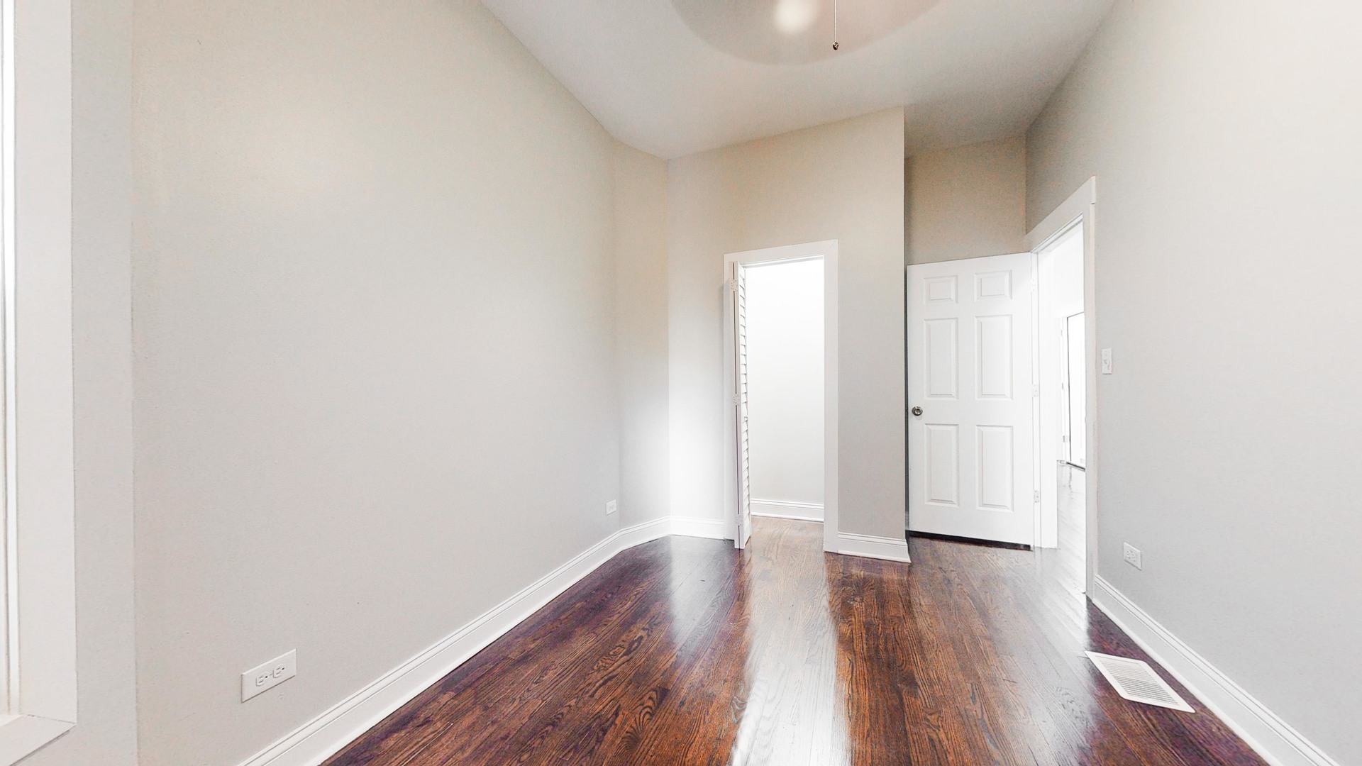 6137 South Morgan Street Chicago, IL 60621 - Photo 17 of 33 a view of a room with wooden floor