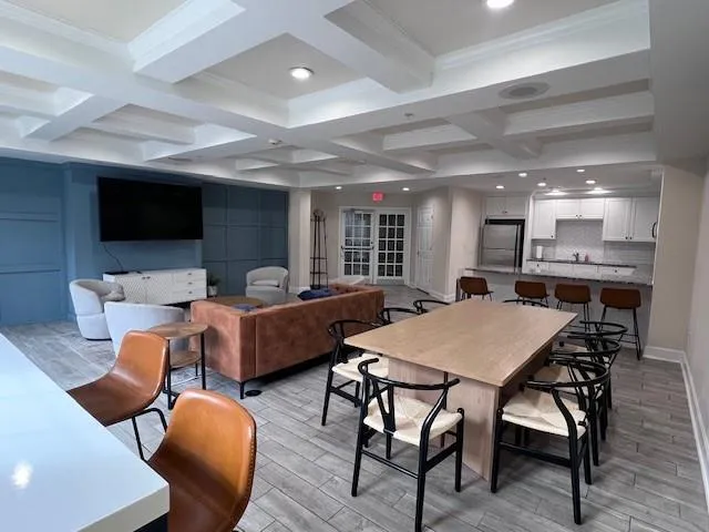 a view of a dining room with furniture