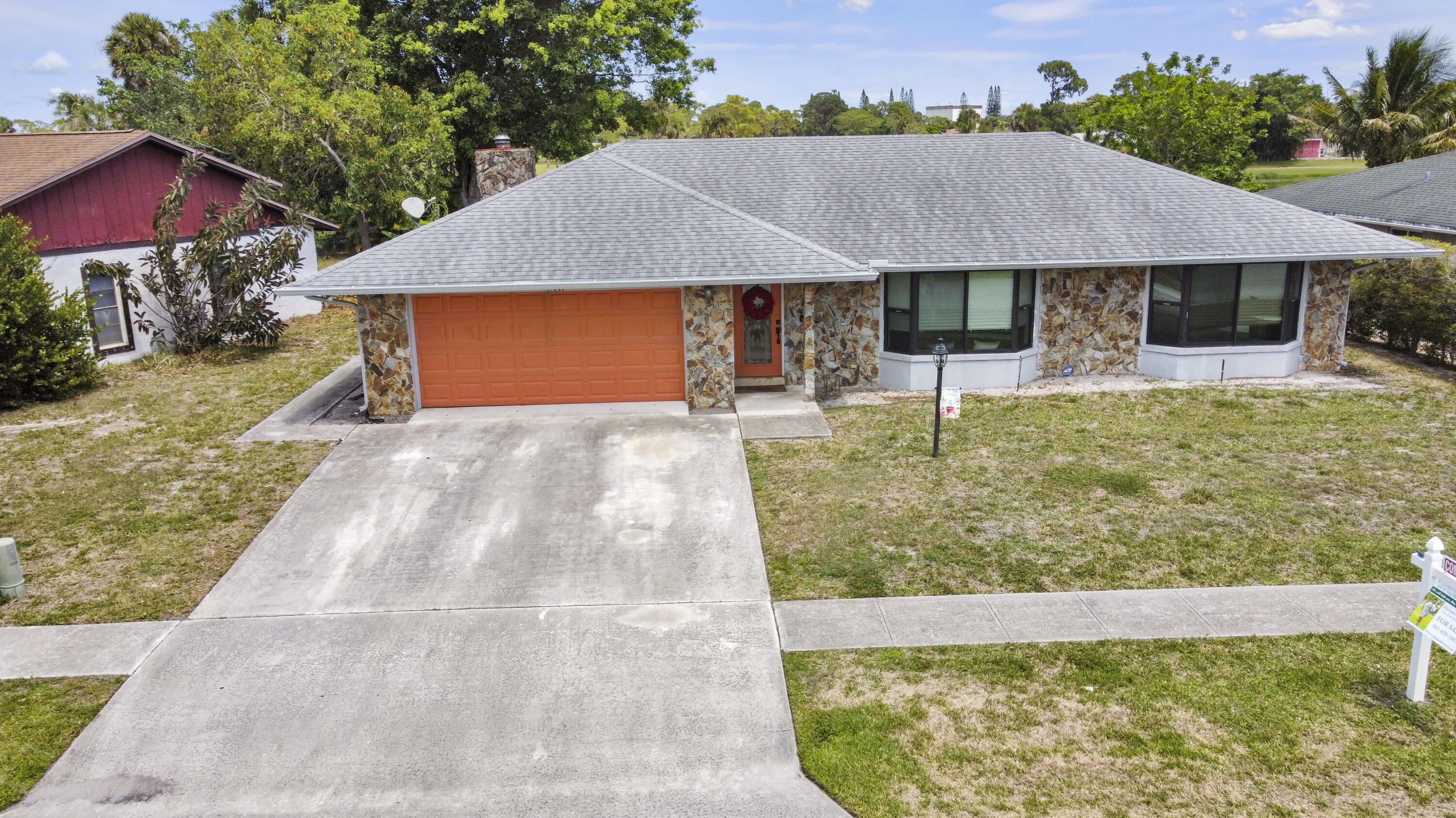 210 Lochmore Road Riviera Beach, FL 33407 - Photo 4 of 36 dji_fly_20230510_140532_315_168384470460