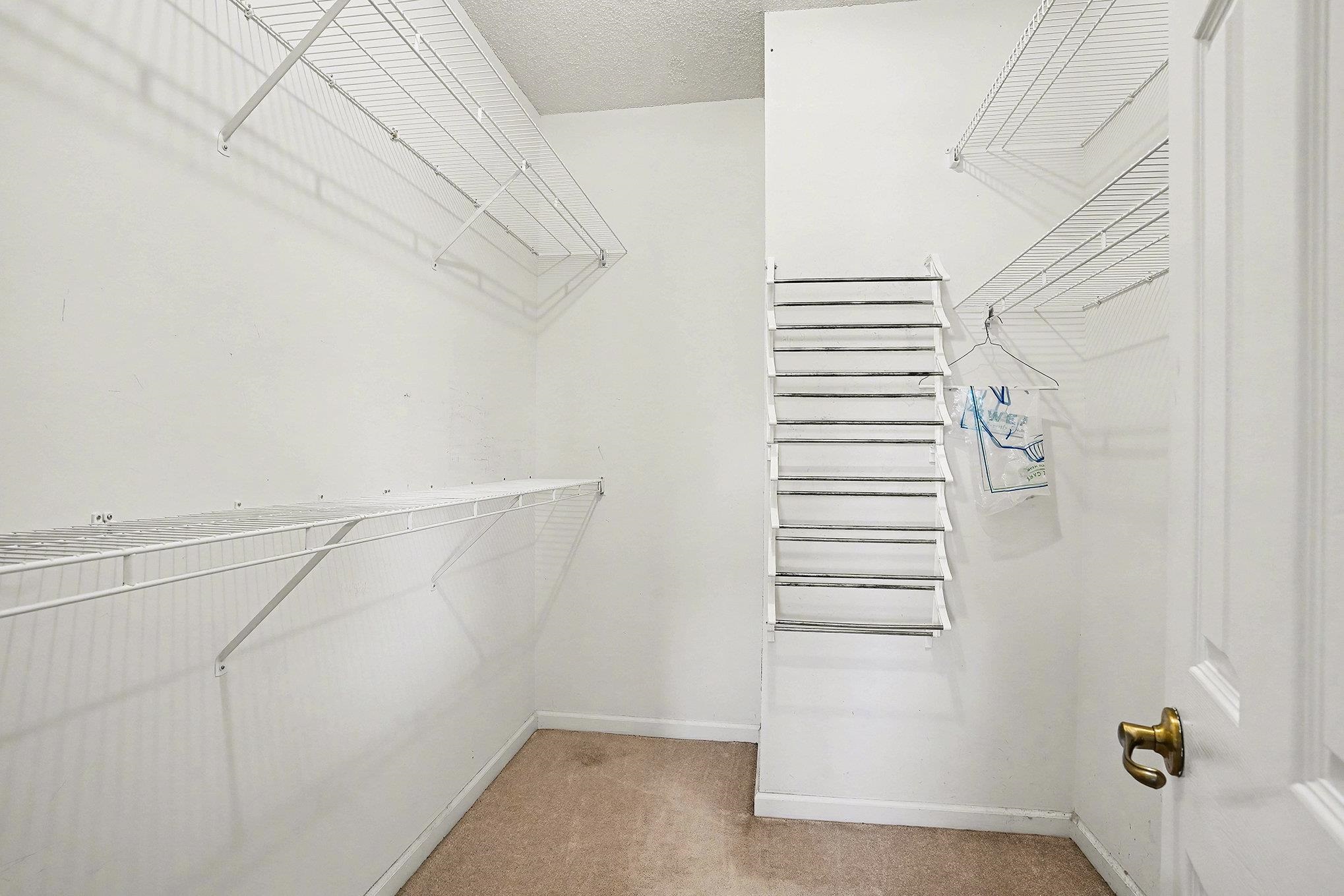 4429 Turtle Lane, Unit 3A Little River, SC 29566 - Photo 20 of 31 Spacious closet with light carpet