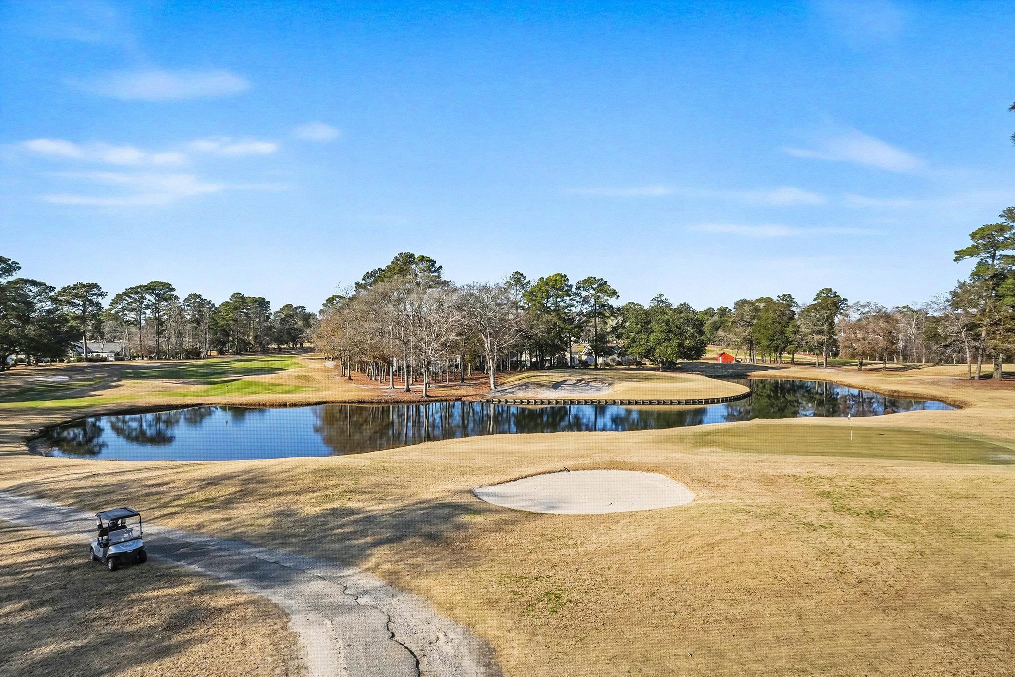 4429 Turtle Lane, Unit 3A Little River, SC 29566 - Photo 31 of 31 View of home's community featuring a water view, view of golf course, view of wooded area, and a lawn