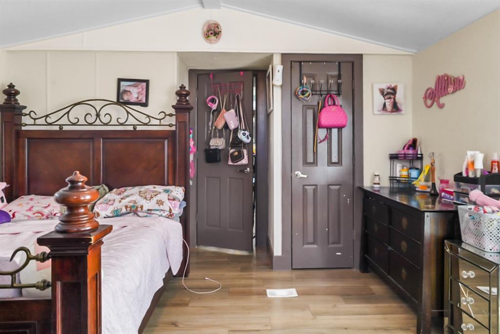 244 Smith Circle Point, TX 75472 - Photo 9 of 15 Bedroom featuring light wood-style flooring