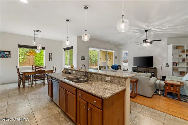 a kitchen with counter space and living room