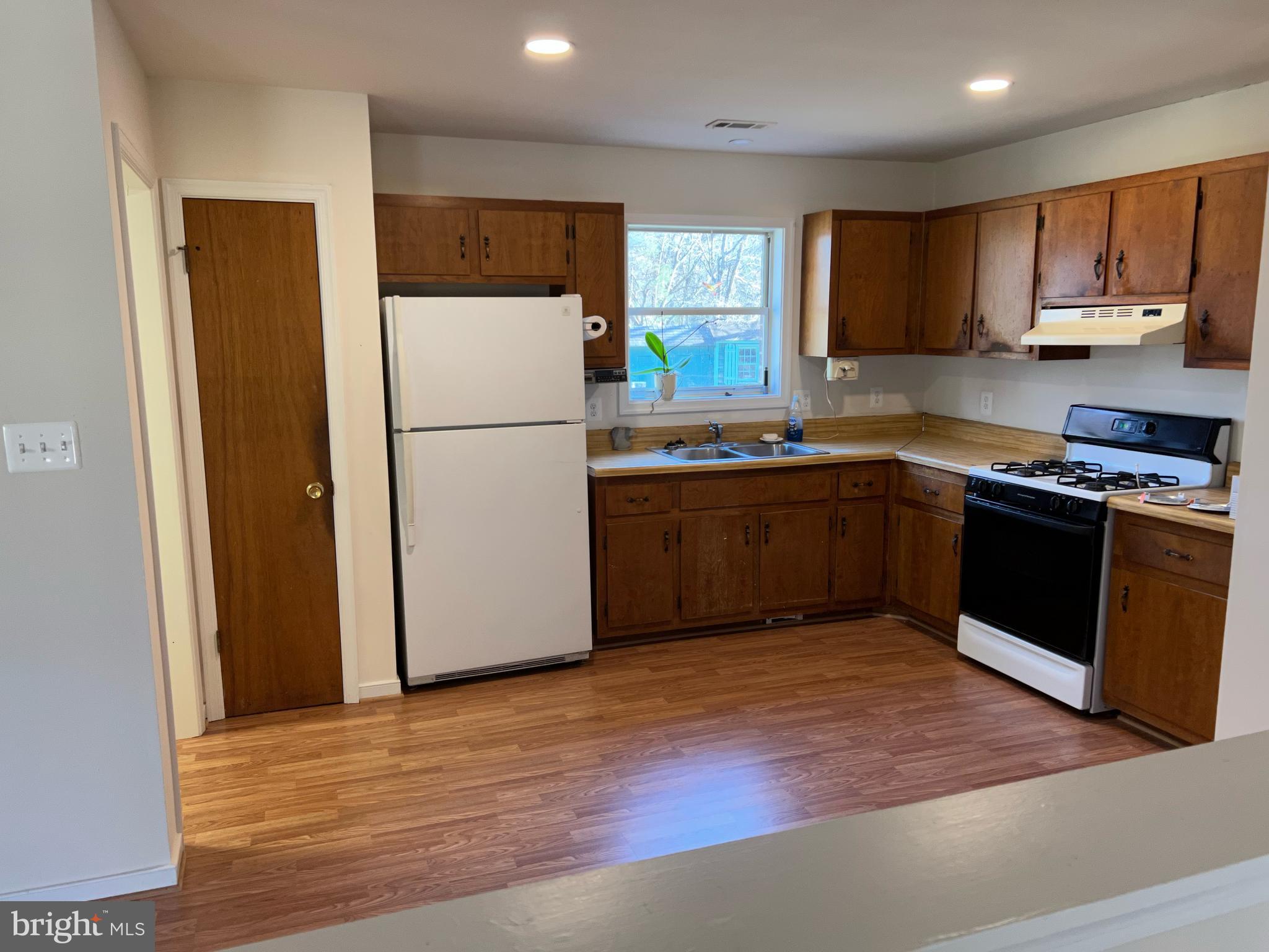 8307 Kines Road Warrenton, VA 20187 - Photo 4 of 46 Kitchen with Gas Stove and Pantry Closet.