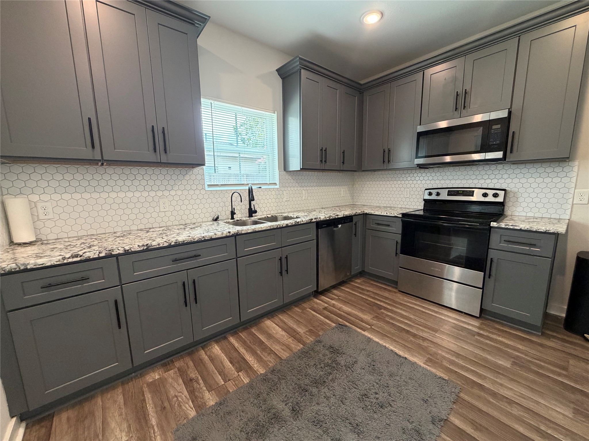 8049 Ritz Street, Unit B Houston, TX 77028 - Photo 1 of 19 Large Kitchen with all appliances.