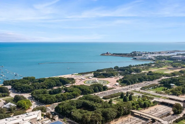 a view of a city with tall buildings