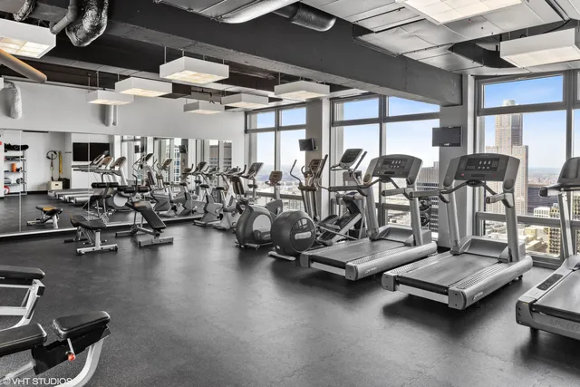 a view of a kitchen with a large window