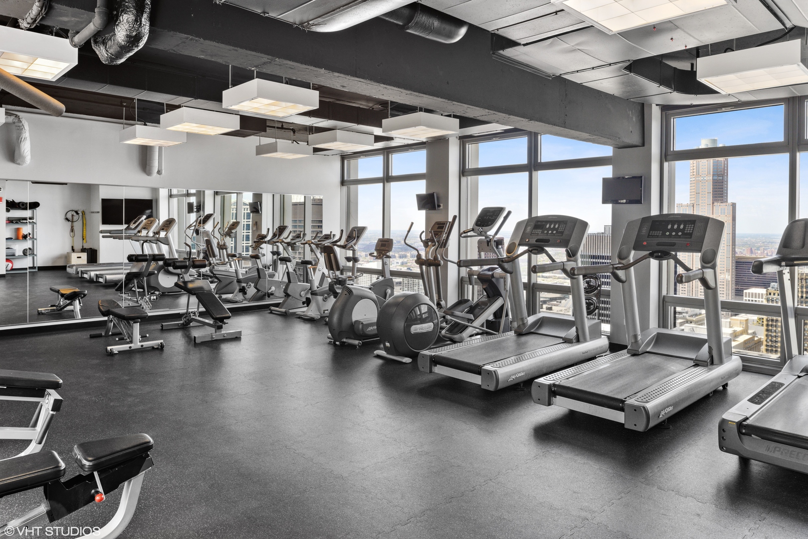 65 East Monroe Street, Unit 4405 Chicago, IL 60603 - Photo 17 of 27 a view of a room with gym equipment