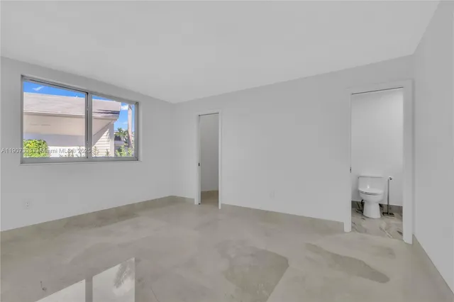 an empty room with windows