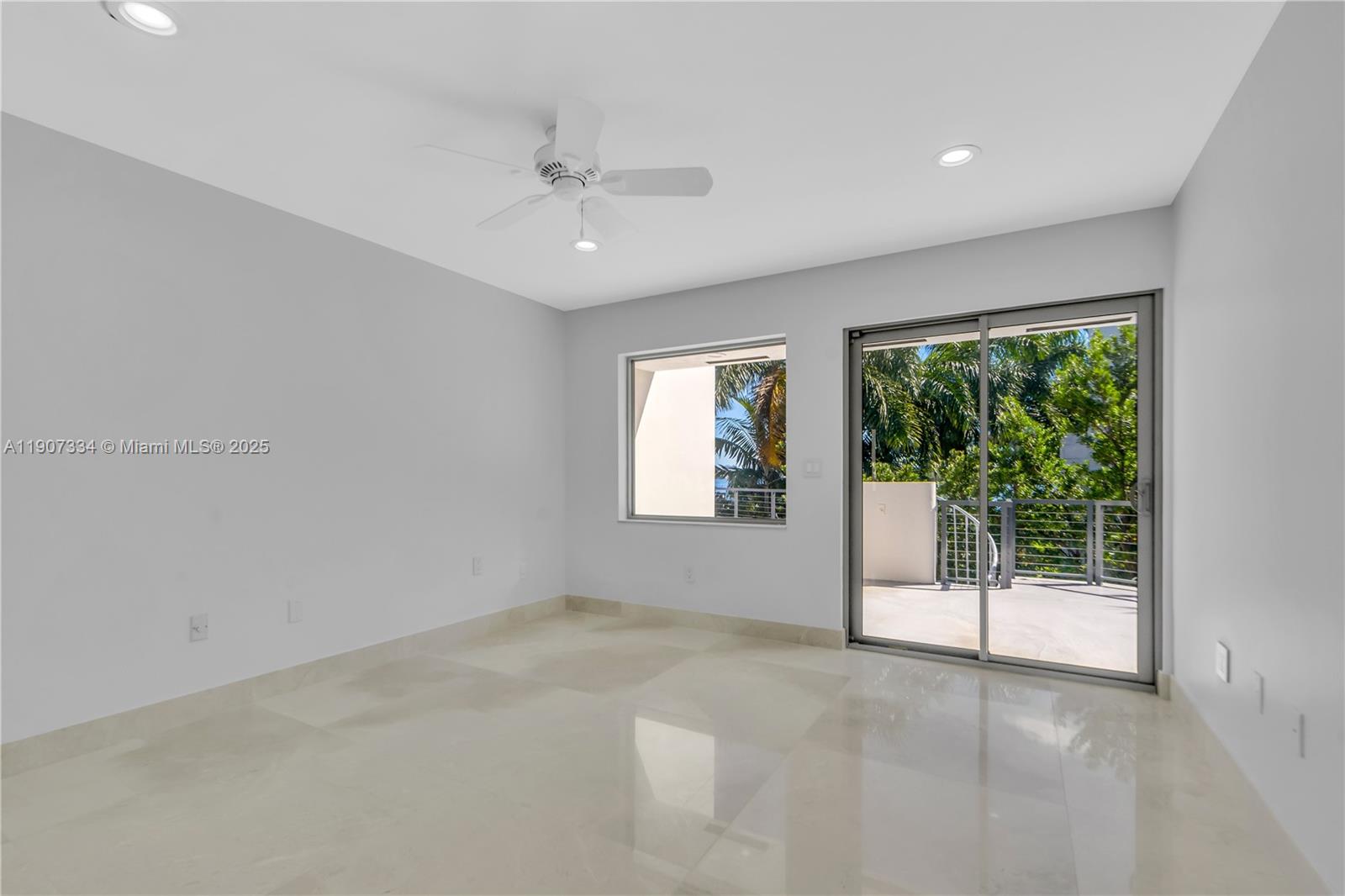 2089 Northeast 121st Road North Miami, FL 33181 - Photo 18 of 30 a view of a livingroom with a ceiling fan and window