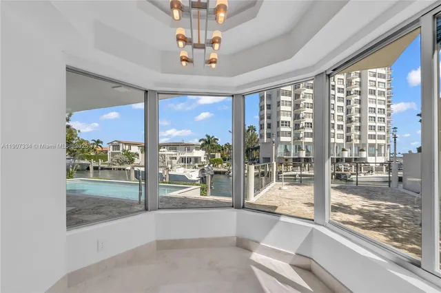 a view of a swimming pool and an outdoor space