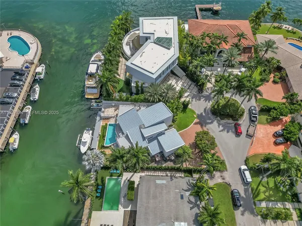 an aerial view of a house with outdoor space