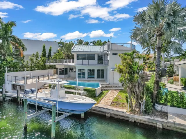 a view of a lake with a house
