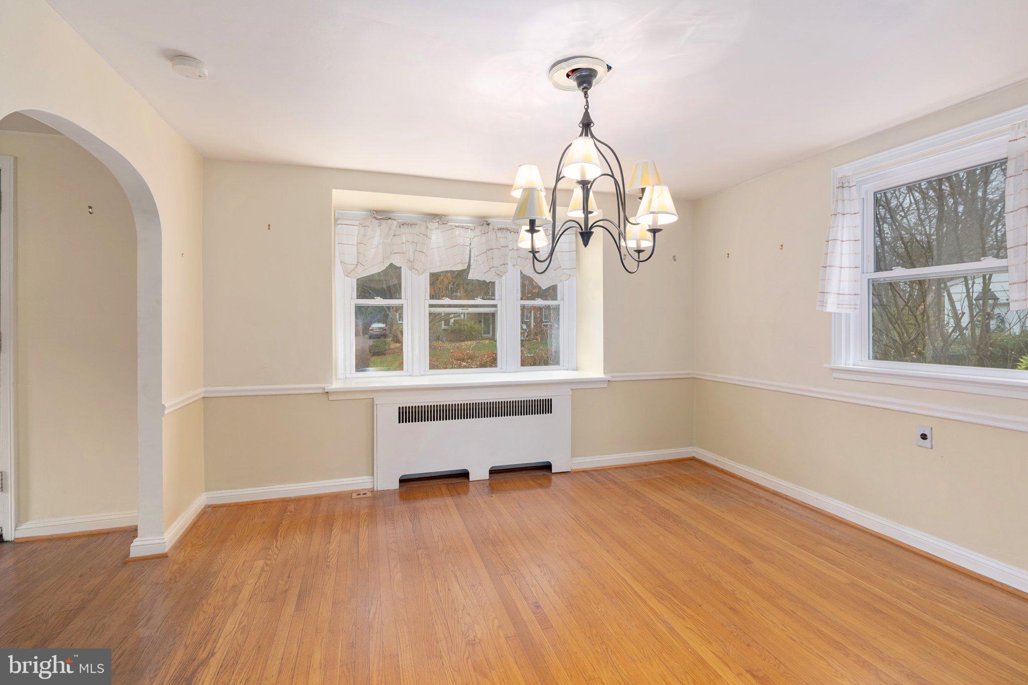 443 Old Farm Road Wyncote, PA 19095 - Photo 13 of 35 a view of empty room with wooden floor and fan