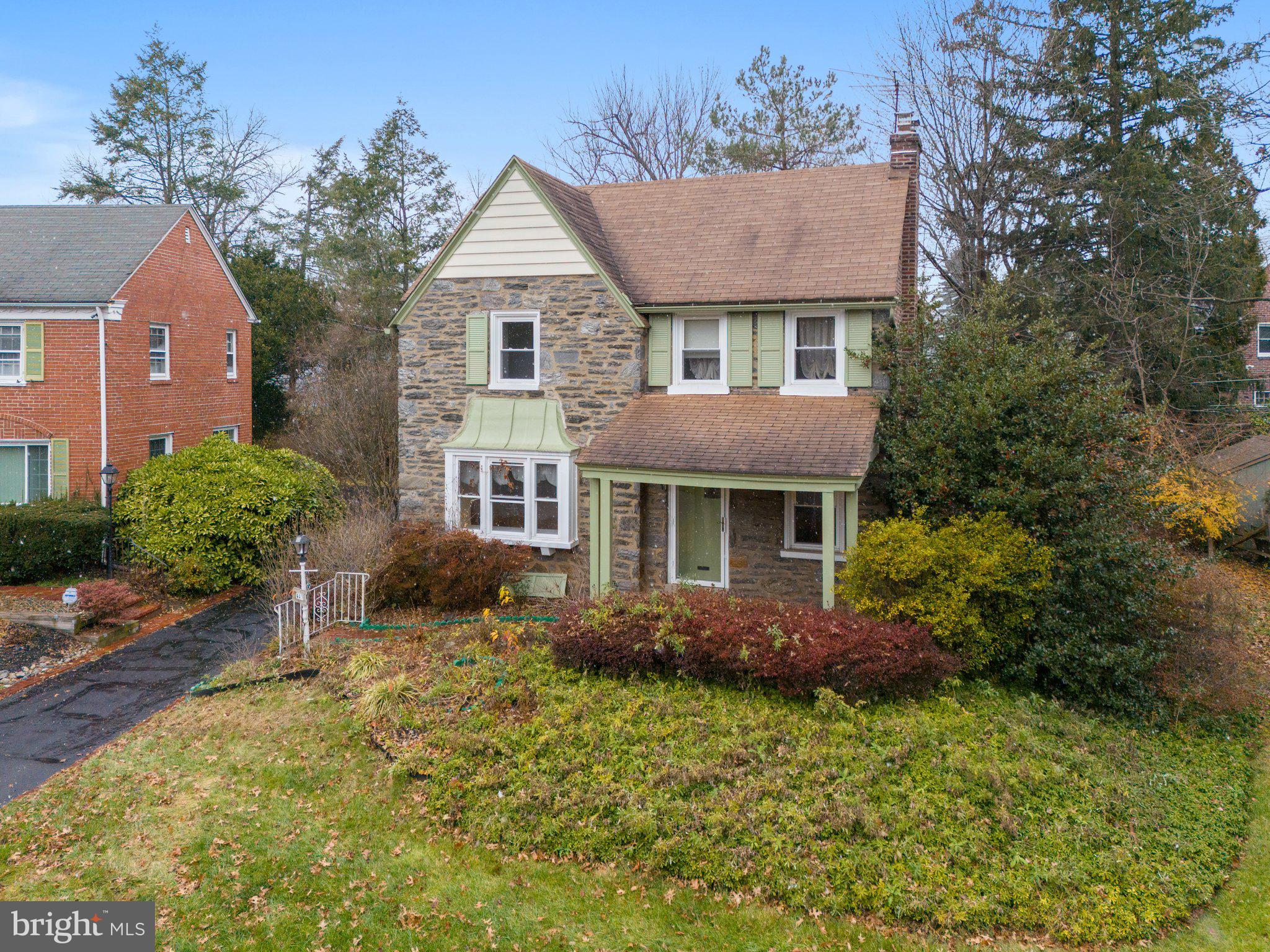 443 Old Farm Road Wyncote, PA 19095 - Photo 5 of 35 a front view of a house with garden