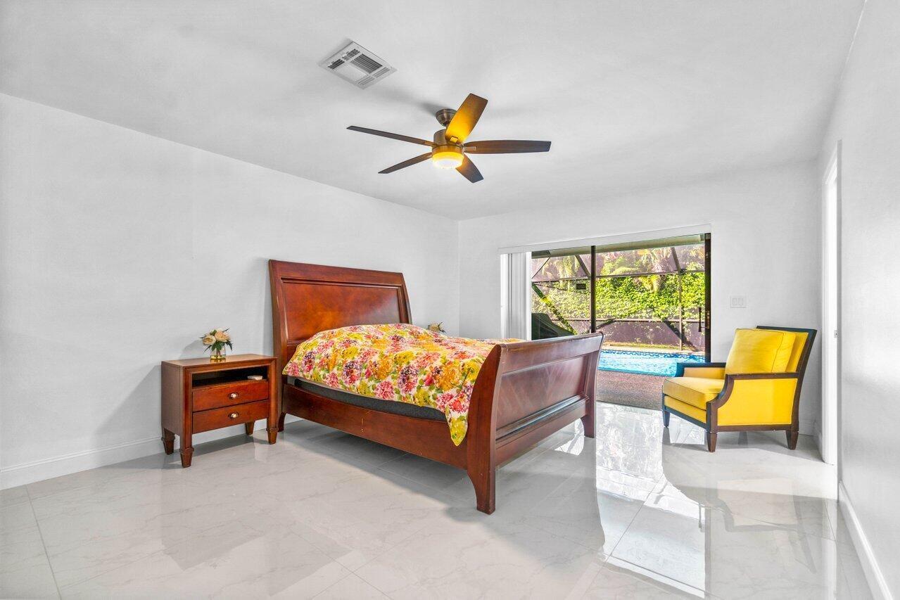 2683 Northwest 45th Street Boca Raton, FL 33434 - Photo 14 of 28 Primary Bedroom