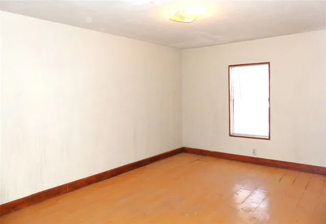 an empty room with a window