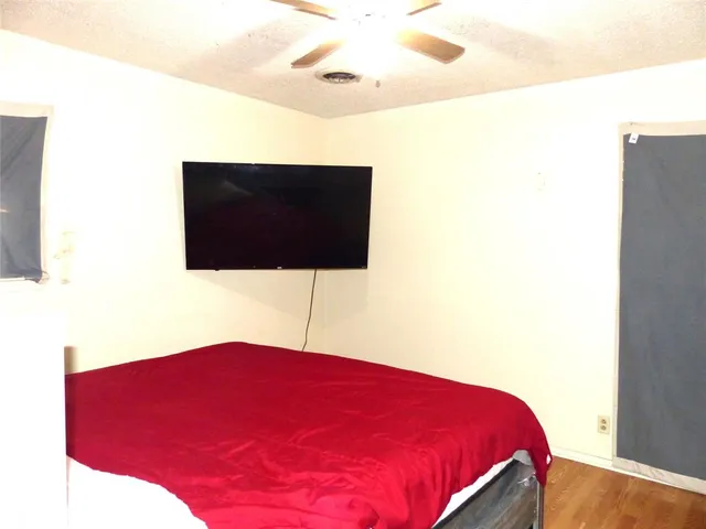 a living room with a bed