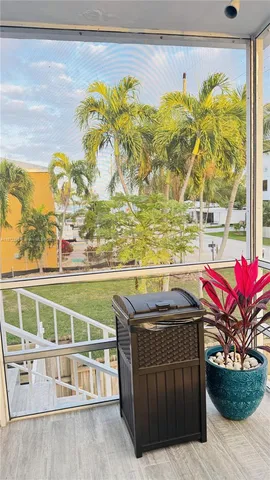 a view of a chairs and table in the terrace