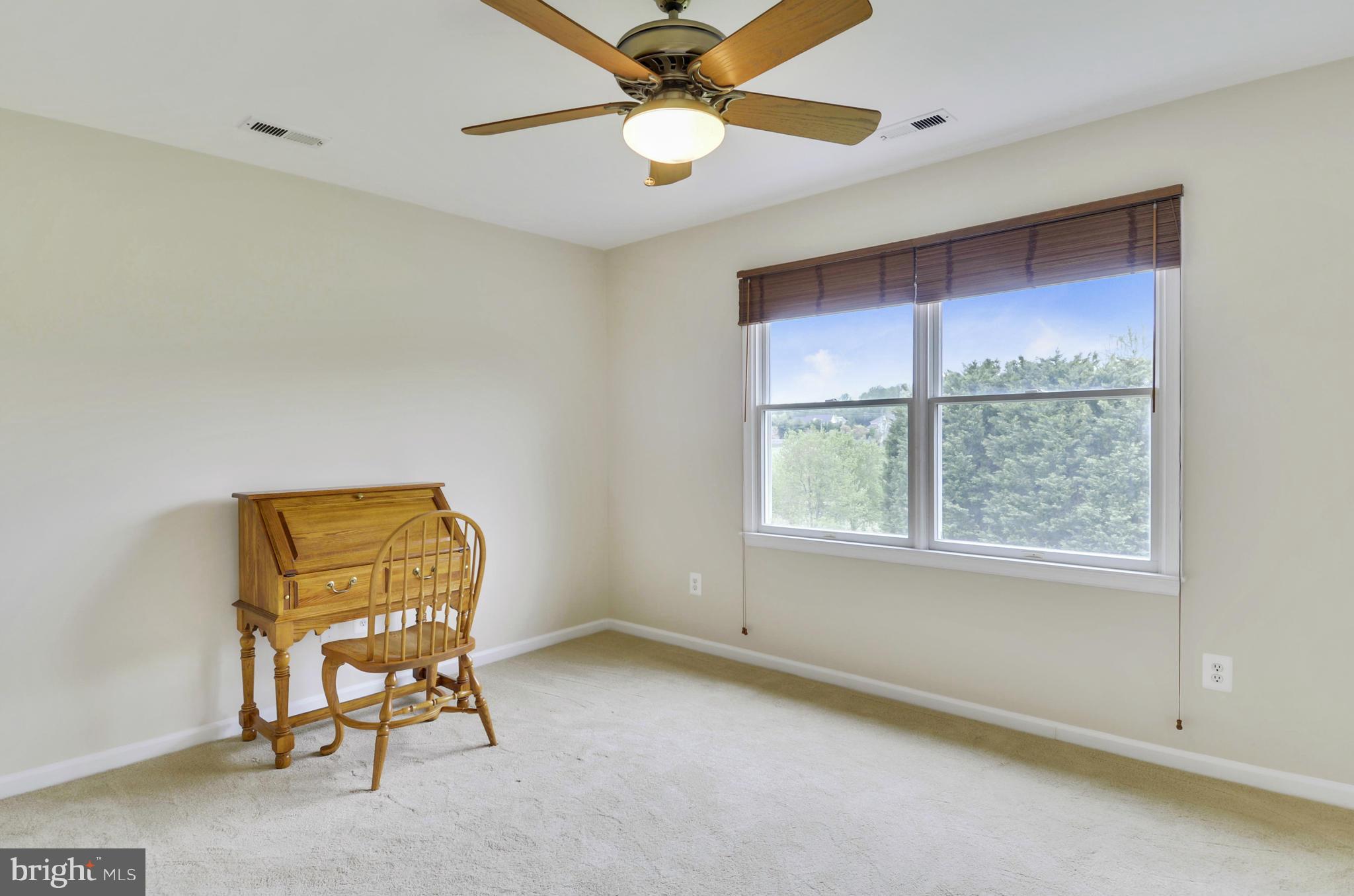 1327 Dasher Lane Reston, VA 20190 - Photo 26 of 30 a view of room with window and ceiling fan