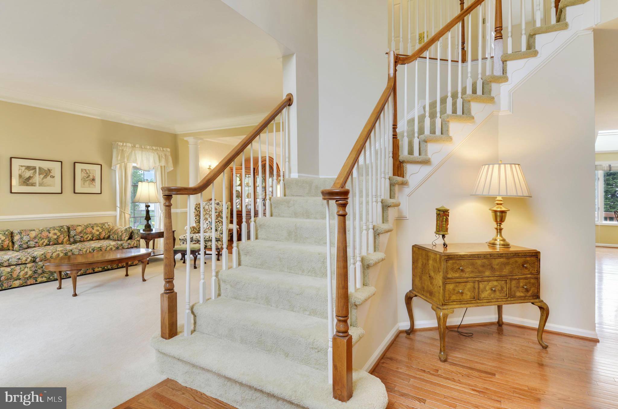 1327 Dasher Lane Reston, VA 20190 - Photo 3 of 30 a view of entryway and hall with wooden floor