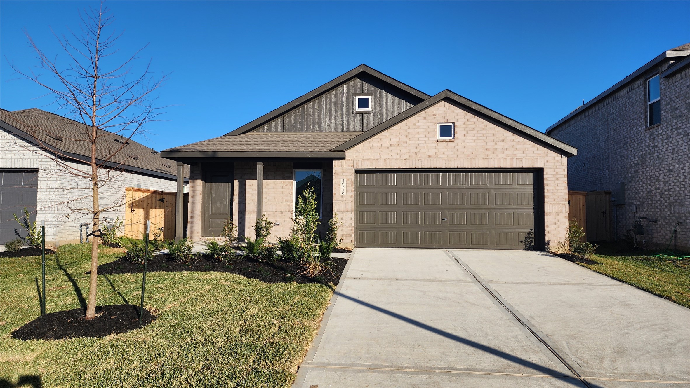 16210 Rustic Prairie Drive Hockley, TX 77447 - Photo 1 of 40 a front view of a house with garden