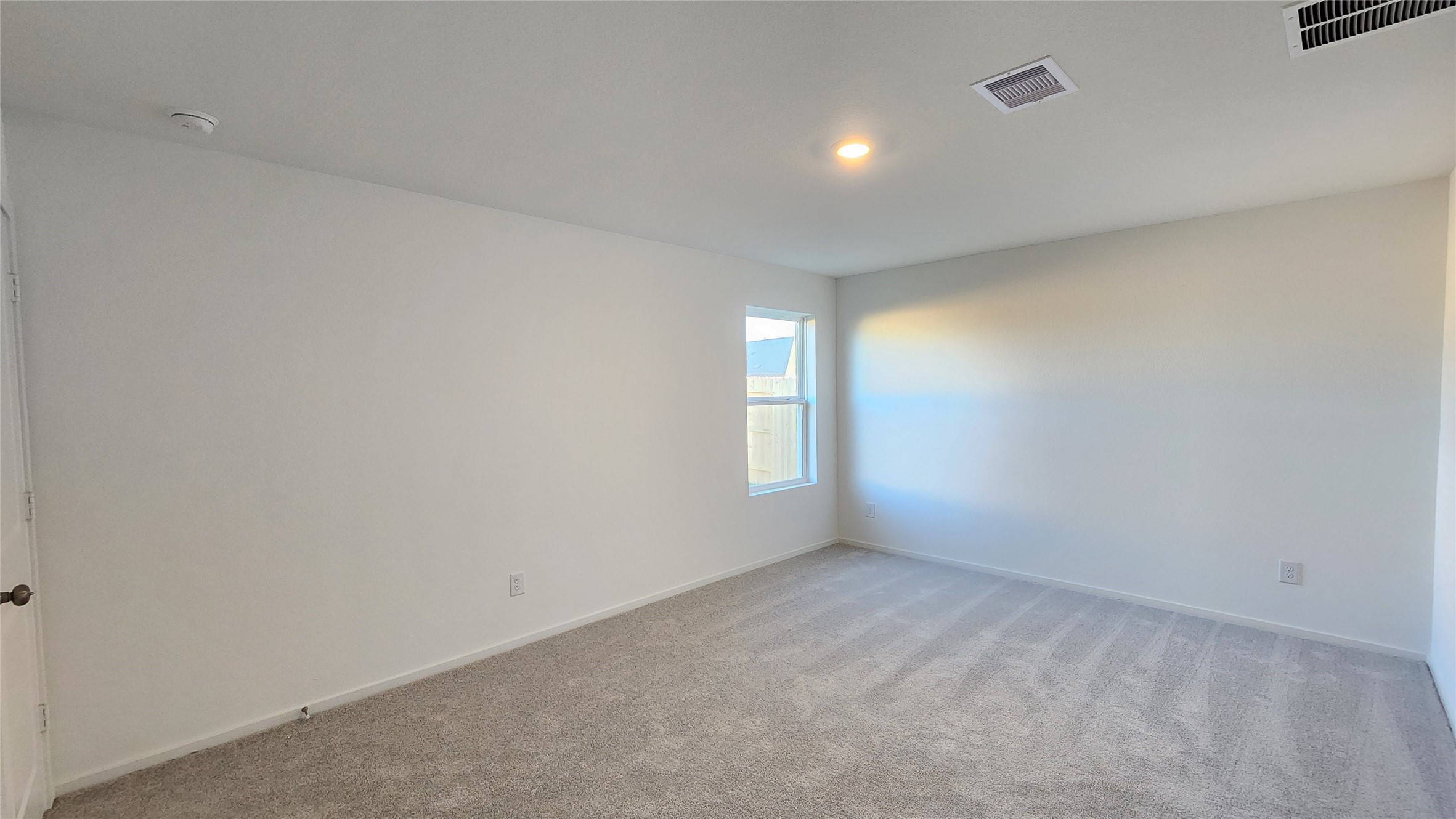 16210 Rustic Prairie Drive Hockley, TX 77447 - Photo 19 of 40 a view of an empty room with a window
