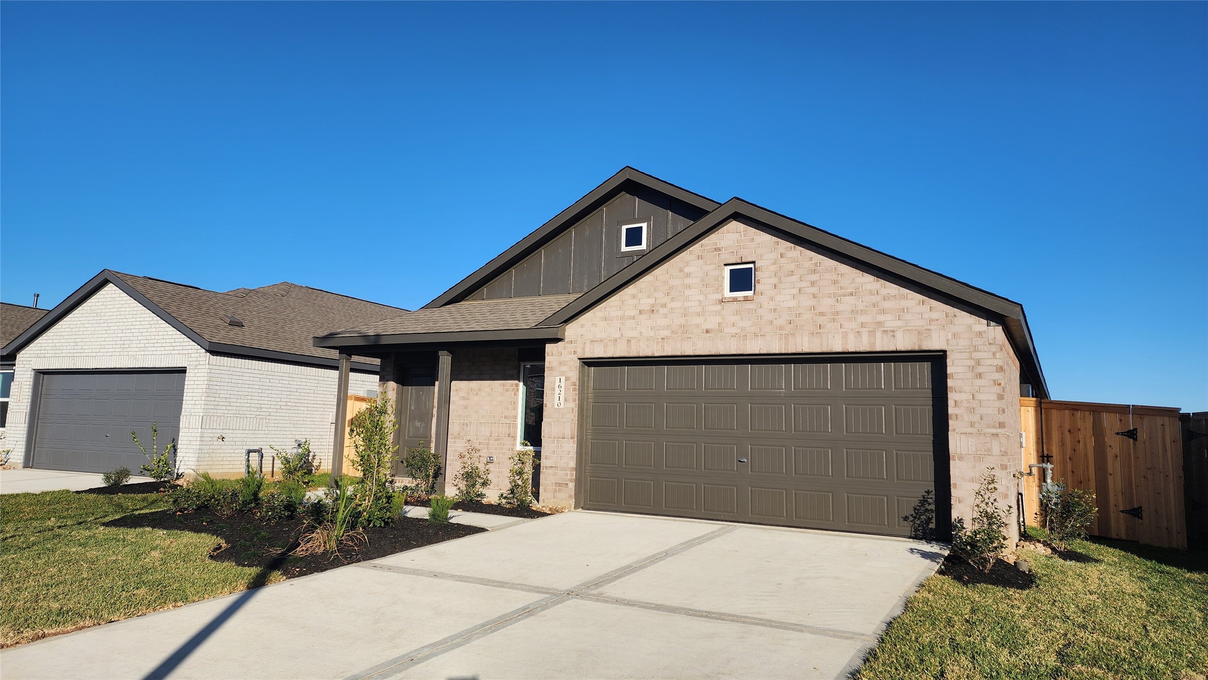16210 Rustic Prairie Drive Hockley, TX 77447 - Photo 2 of 40 a front view of a house with garden
