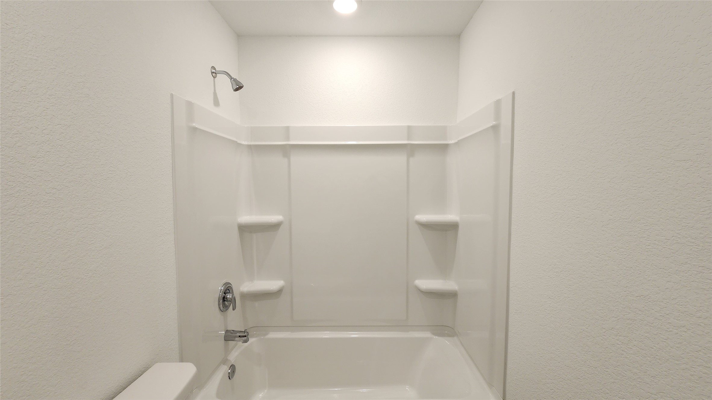 16210 Rustic Prairie Drive Hockley, TX 77447 - Photo 26 of 40 a bathroom with a shower a toilet and sink