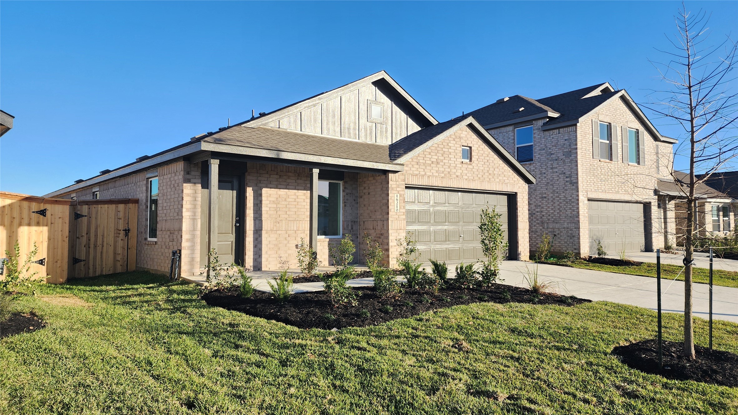 16210 Rustic Prairie Drive Hockley, TX 77447 - Photo 3 of 40 a front view of a house with garden