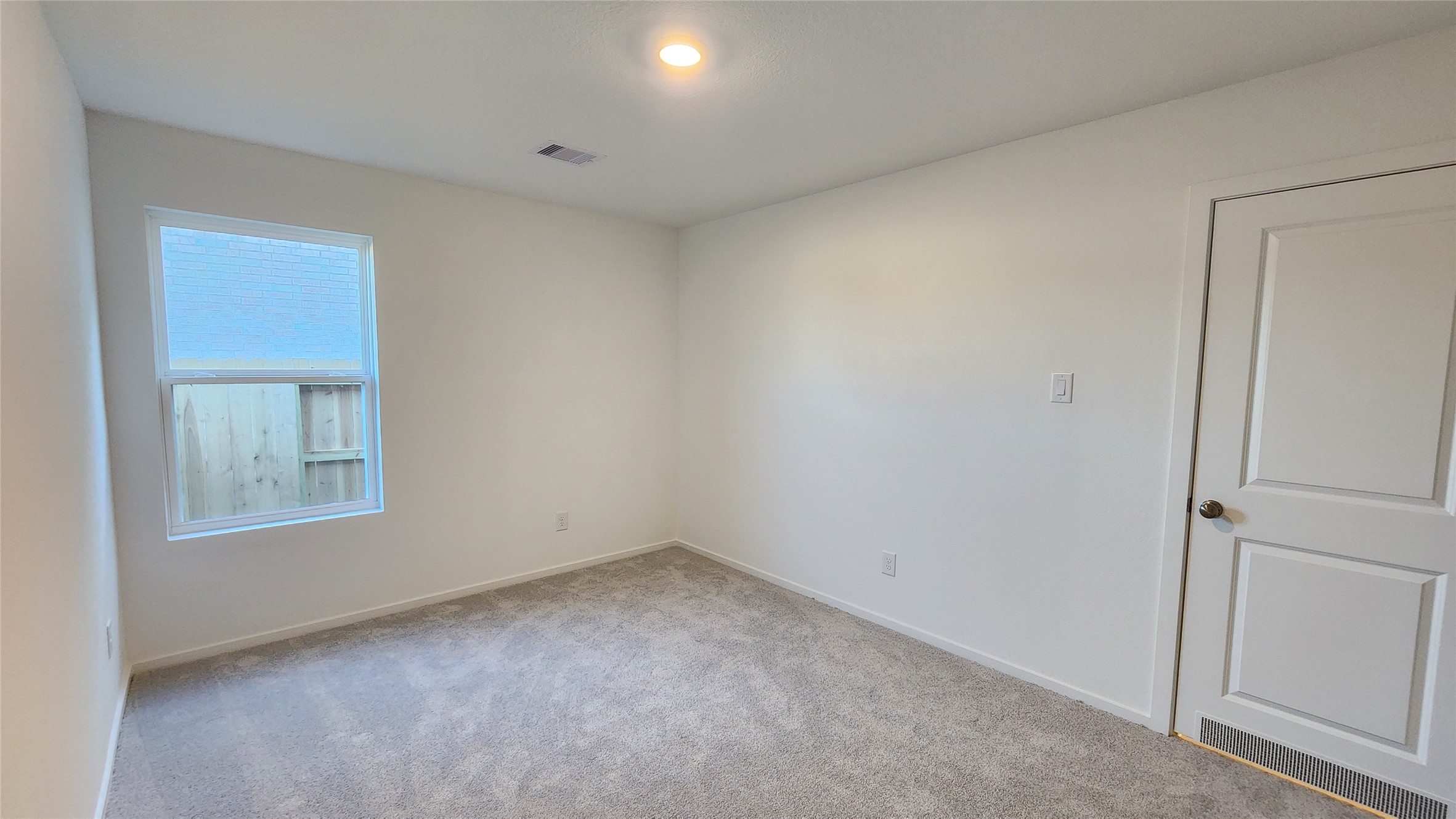 16210 Rustic Prairie Drive Hockley, TX 77447 - Photo 35 of 40 an empty room with windows