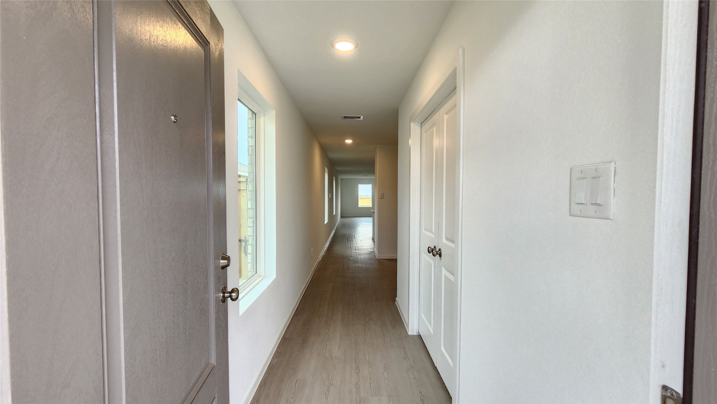 16210 Rustic Prairie Drive Hockley, TX 77447 - Photo 4 of 40 a view of hallway with wooden floor