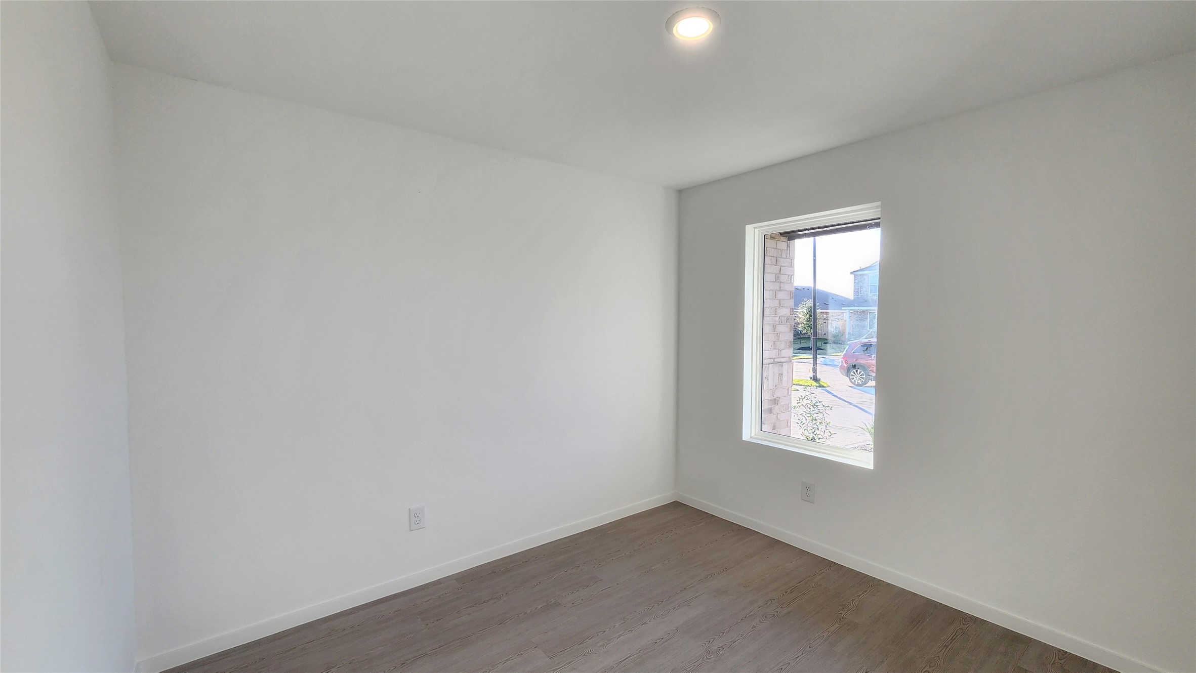 16210 Rustic Prairie Drive Hockley, TX 77447 - Photo 7 of 40 an empty room with windows