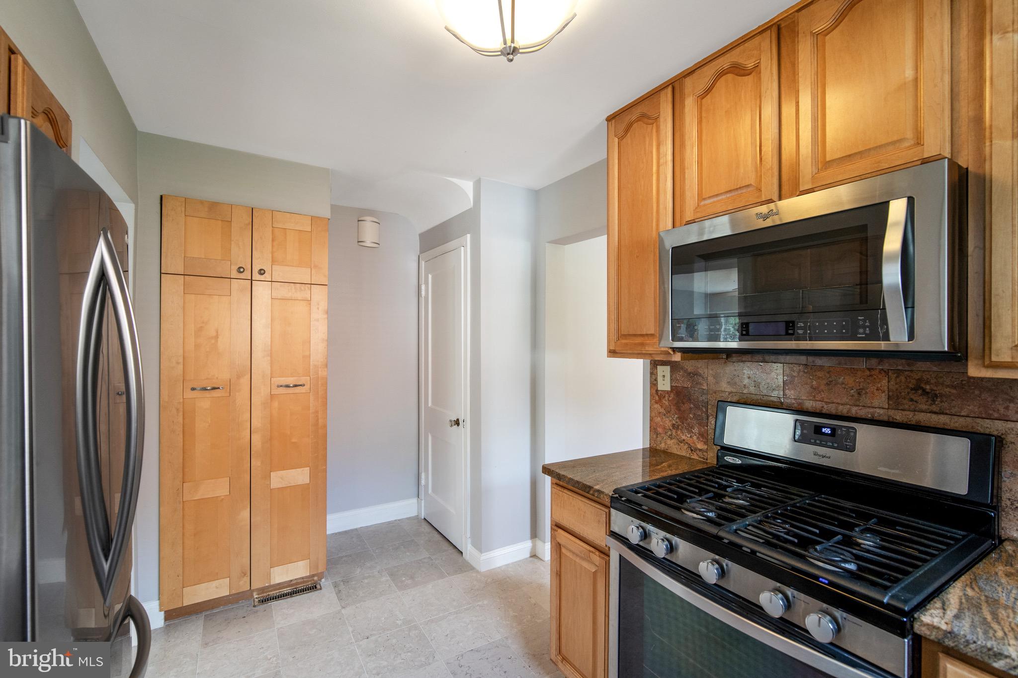 2106 Dayton Street Silver Spring, MD 20902 - Photo 13 of 28 Kitchen with Stainless Steel Appliances