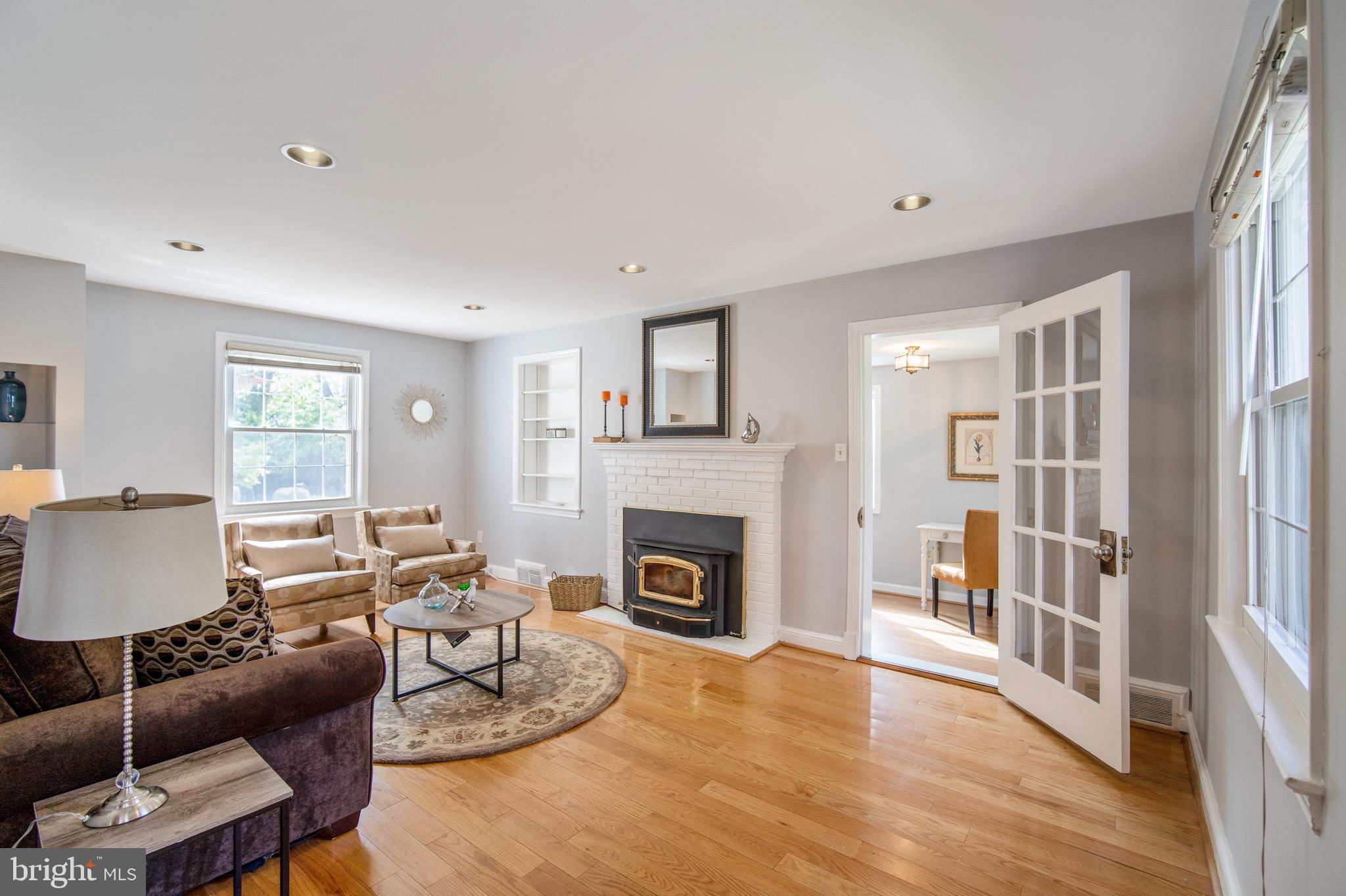 2106 Dayton Street Silver Spring, MD 20902 - Photo 6 of 28 Living Room with Fireplace and Enclosed porch
