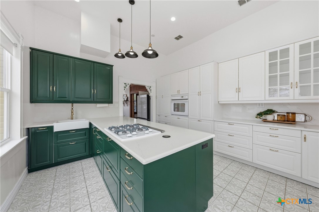 300 Estelle Rice Street Moody, TX 76557 - Photo 22 of 48 a kitchen with cabinets and window