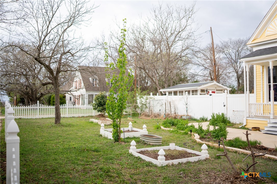 300 Estelle Rice Street Moody, TX 76557 - Photo 45 of 48 a view of a backyard with a garden