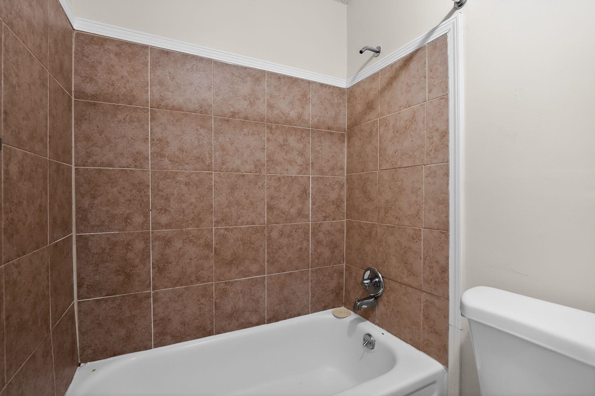 3603 England Street Memphis, TN 38127 - Photo 31 of 36 Bathroom featuring toilet and shower combination