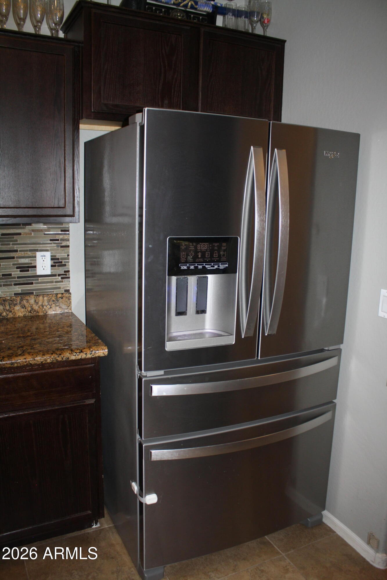 10225 West Camelback Road, Unit 19 Phoenix, AZ 85037 - Photo 12 of 51 a close view of stove and microwave