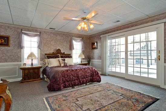 26 Hidden Brook Drive North Barrington, IL 60010 - Photo 15 of 22 a bedroom with a large bed and a large window